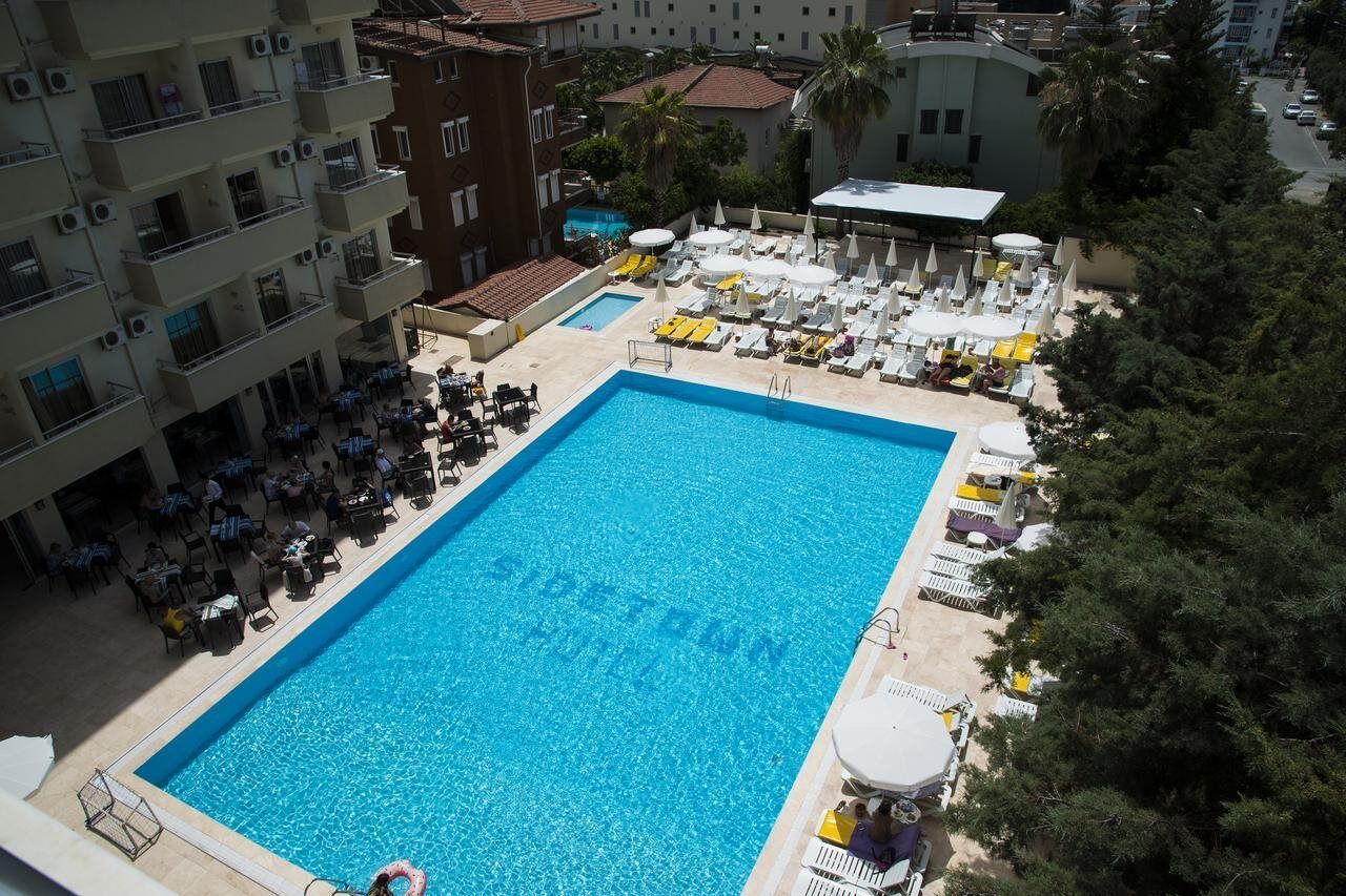Sunbeach Hill Hotel Side Exterior foto
